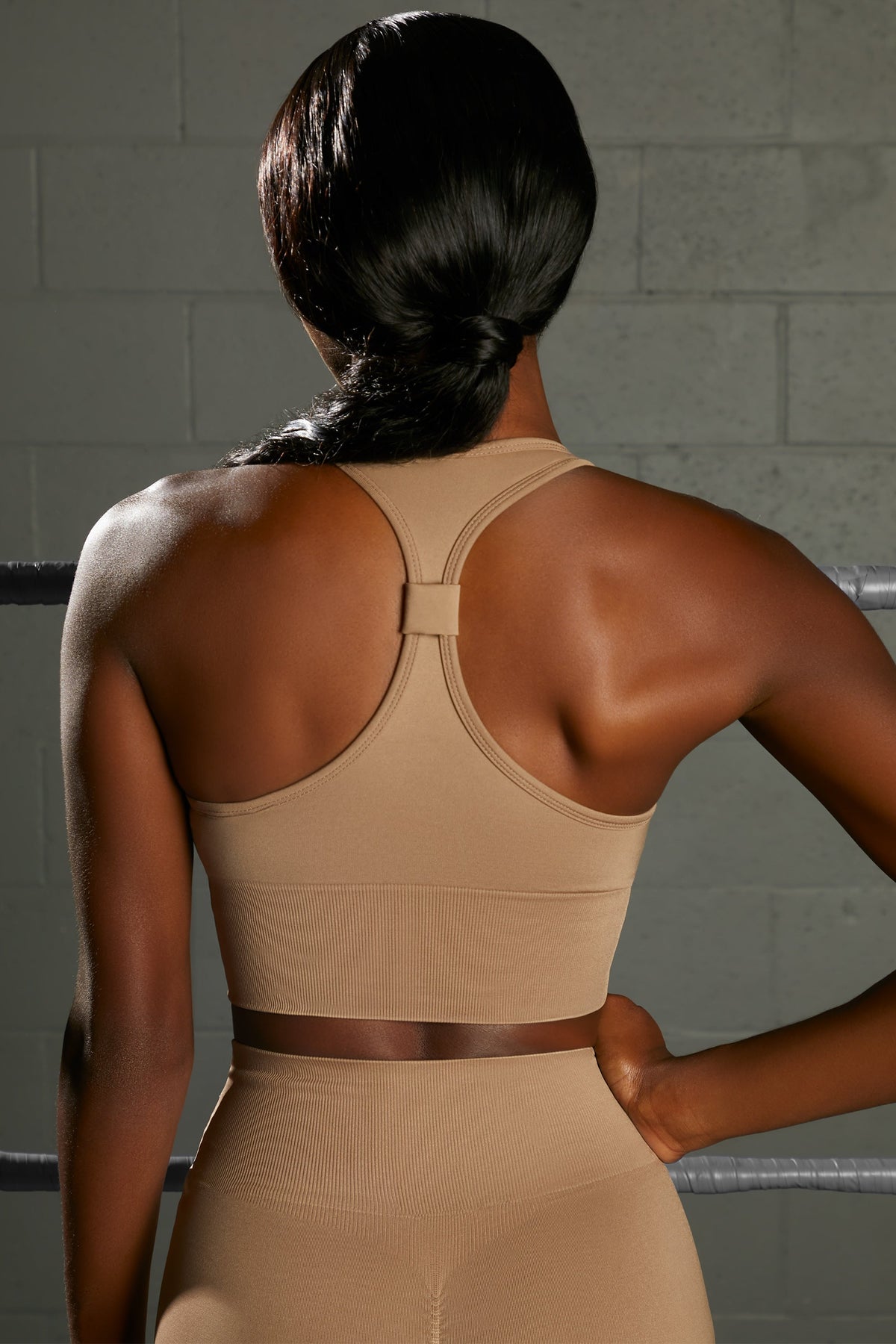 Overhaul Racer Knot Back Seamless Crop Top in Brown