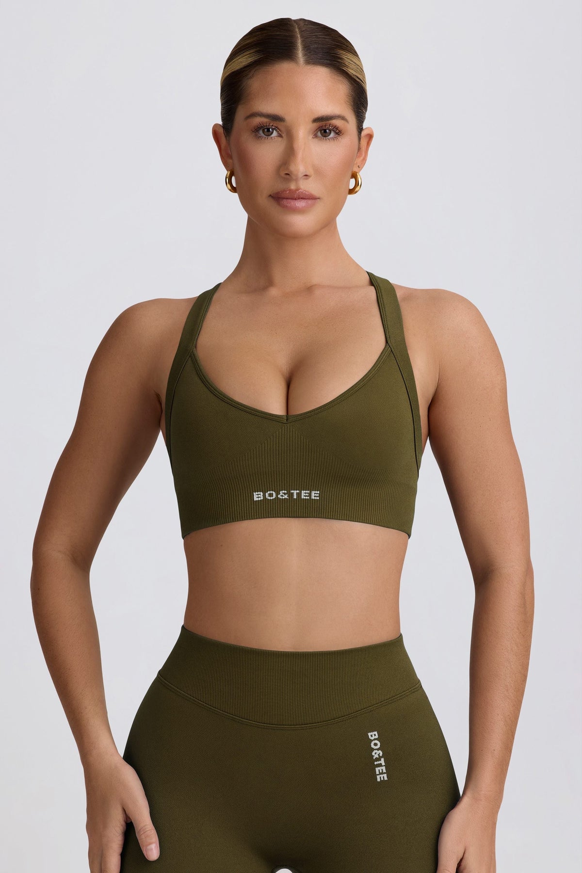 Super Sculpt Seamless Cross-Back Sports Bra in Dark Green